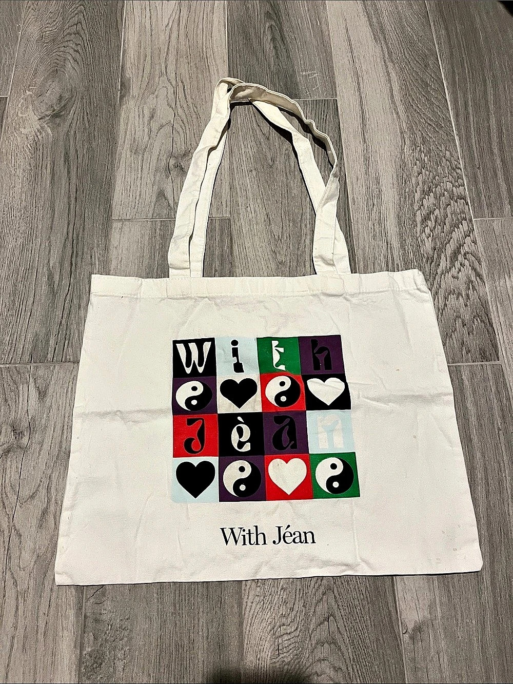 With Jéan Graphic Canvas Tote Bag